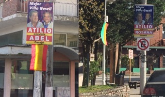 Nuevamente carteles en postes de sealizacin vial y tendido elctrico